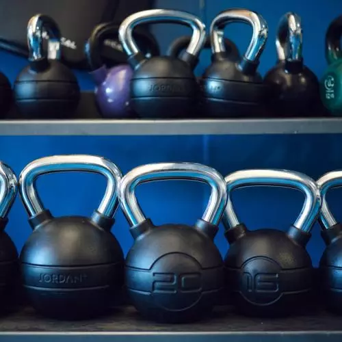 Rows of kettle bells in the University Club Gym